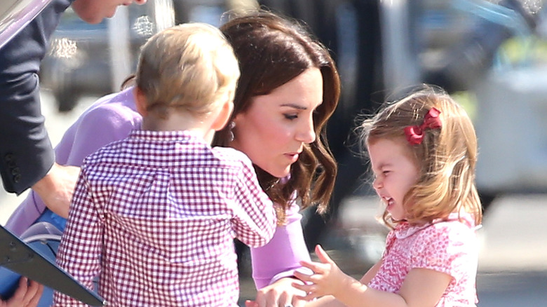 Princess Charlotte crying on tarmac