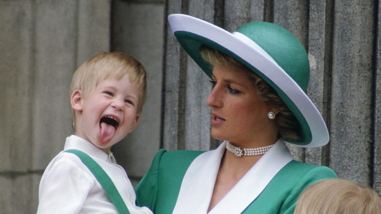 Prince Harry sticking tongue out on balcony