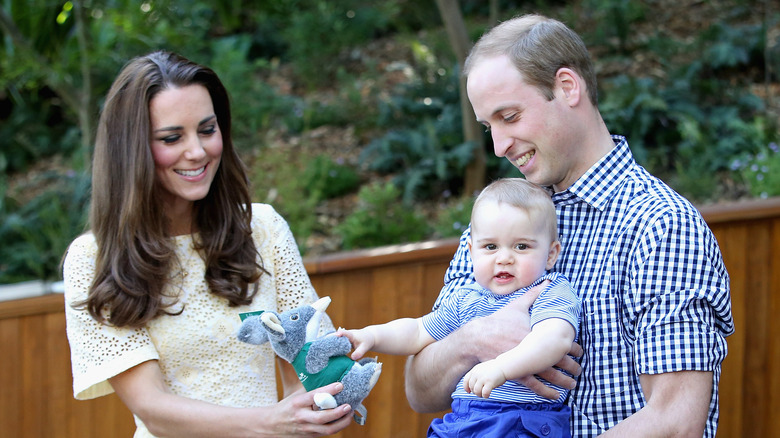 George with his parents at zoo 