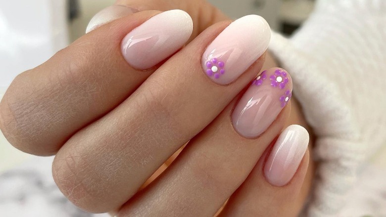 Dainty flowers on "baby boomer"  nails 