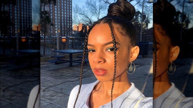 Woman with front braids