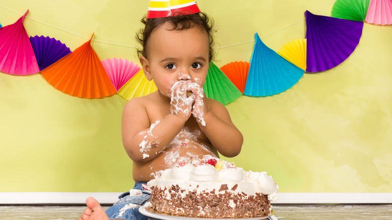 Baby eating cake