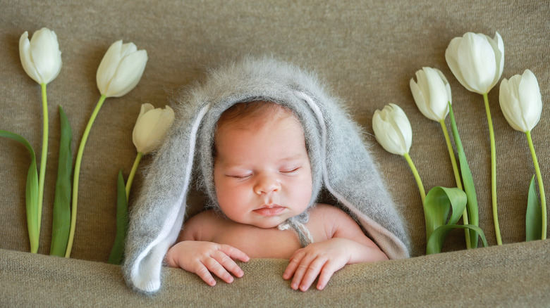 Baby boy with tulips