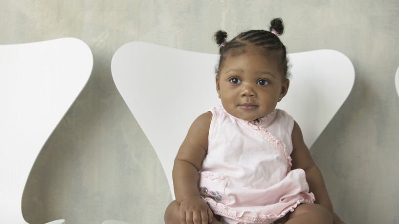 Baby sitting on a chair