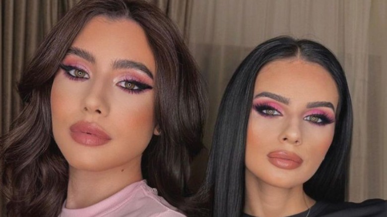 Two women with pink makeup