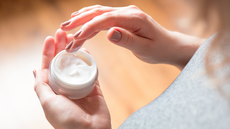 woman using cream