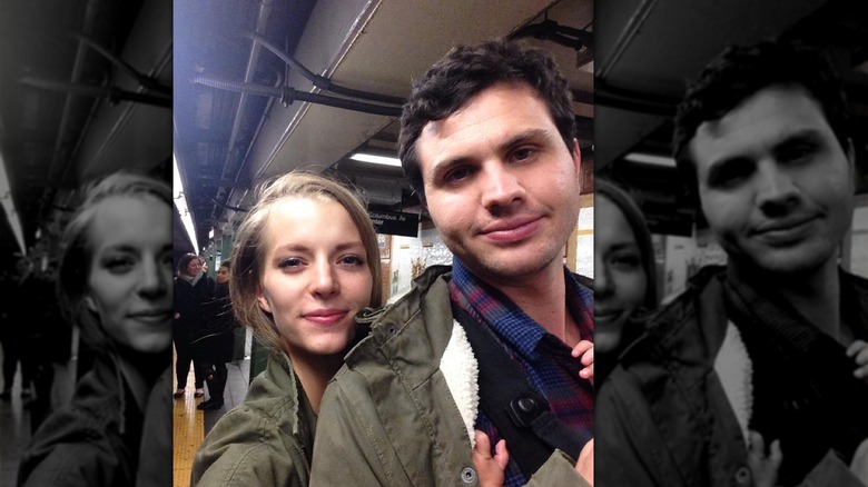 Hannah Neeleman and husband in green jackets in New York subway