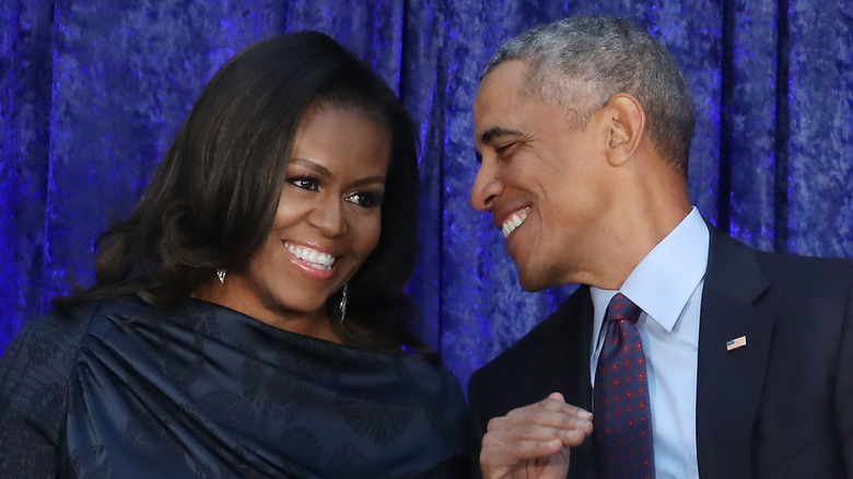 Michelle and Barack Obama smiling 
