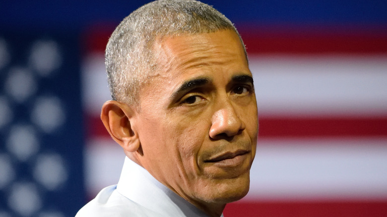 Barack Obama with flag in the background