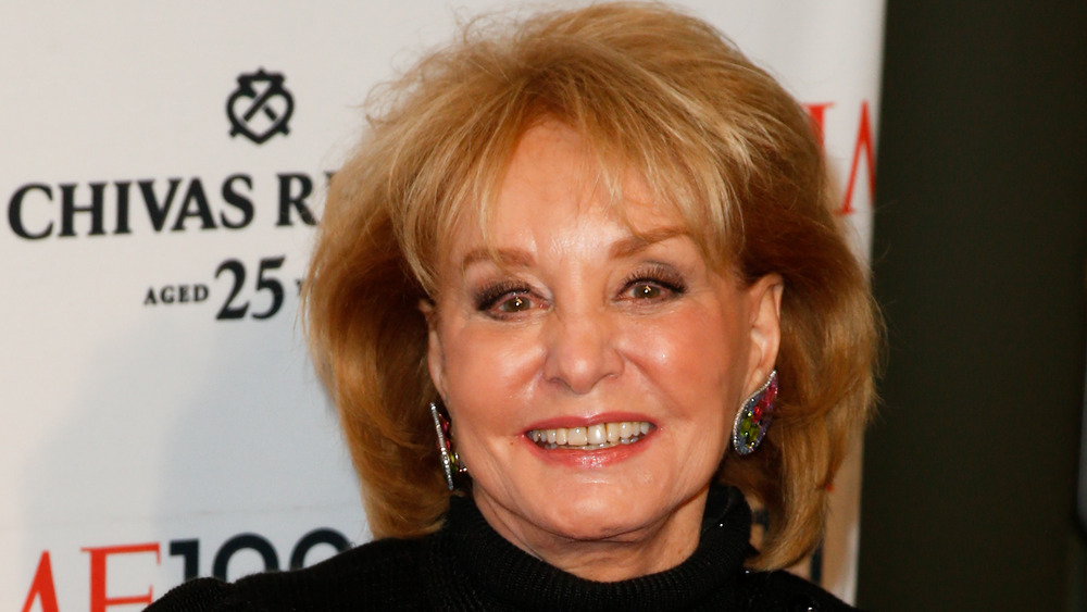 Barbara Walters smiling in black turtleneck