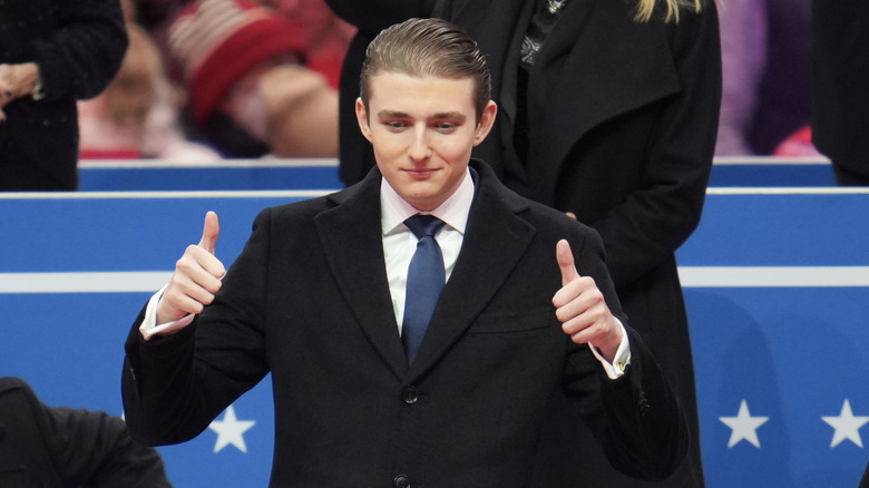 Barron Trump giving the thumbs up at his father's inauguration