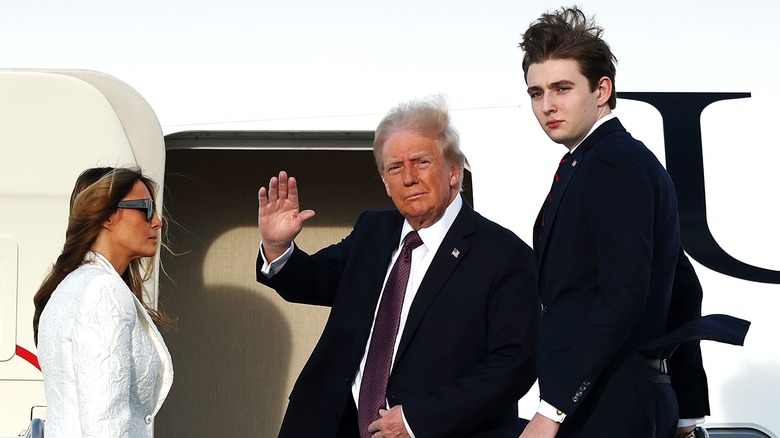 Donald Trump waving alongside Melania and Barron Trump