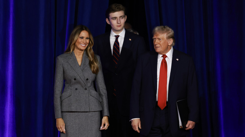 (L-R) Melania Trump, Barron Trump, and Donald Trump pose for photos on Election Night 2024