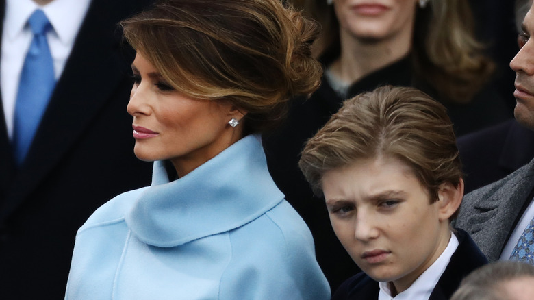 Melania Trump stands next to Barron Trump