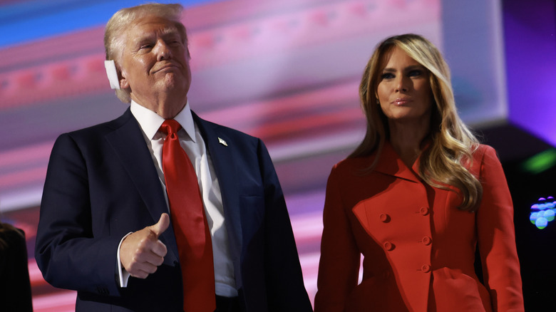 Donald Trump thumbs-up bandaged ear with Melania RNC