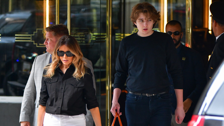 Barron Trump walking with Melania Trump