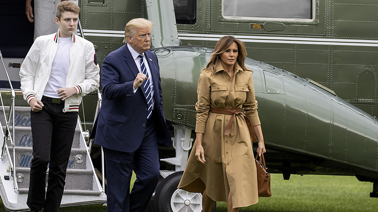 Barron, Donald, Melania Trump leaving helicopter