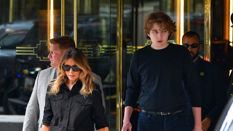 Barron Trump walking with his mom Melania Trump 