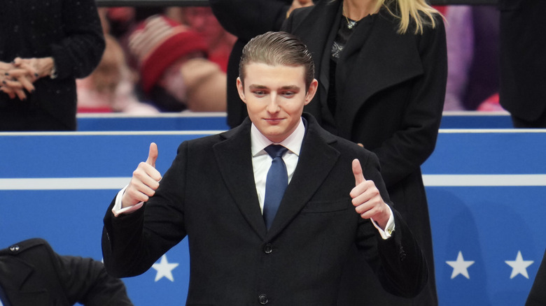 Barron Trump giving double thumbs up at the Capital One Arena