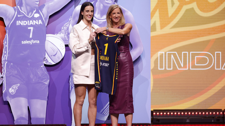 Caitlin Clark poses with WNBA commissioner Cathy Engelbert