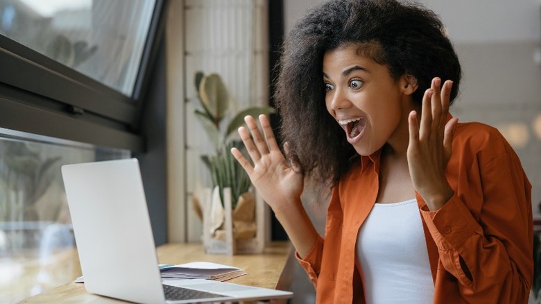 Woman excited about online savings