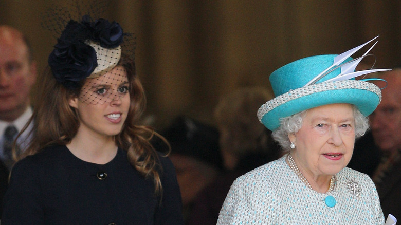 Princess Beatrice and Queen Elizabeth II walking together