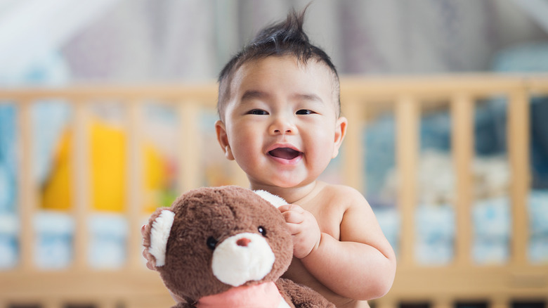 baby boy with teddy bear