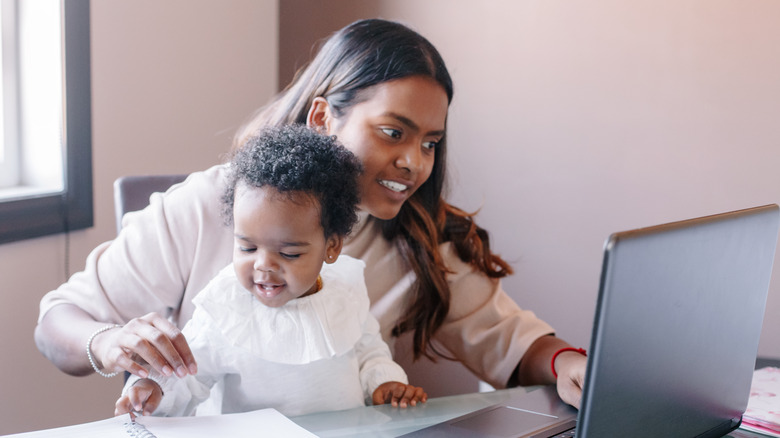 Mom and baby working