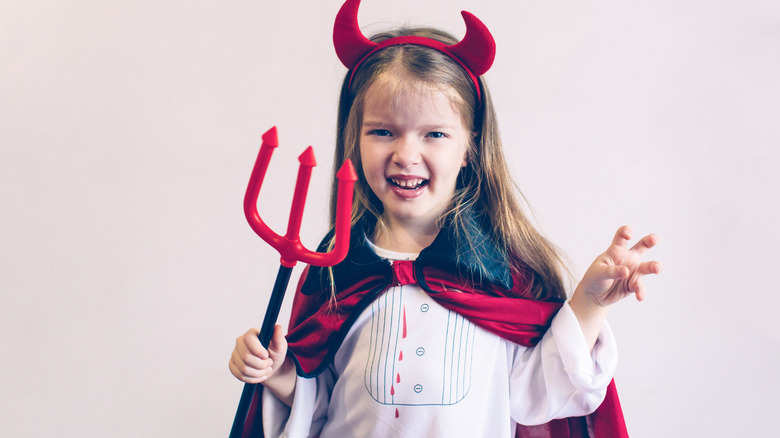 Girl dressed up as the devil
