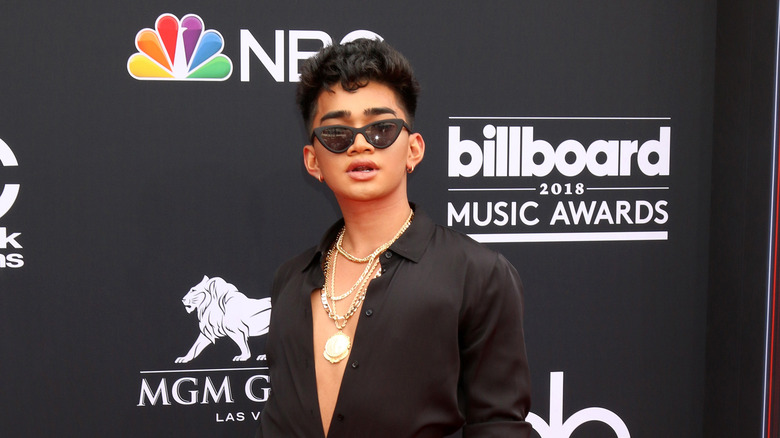 Bretman Rock poses at a red carpet event