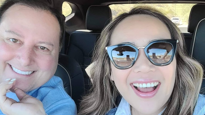 David and Annie smiling in car