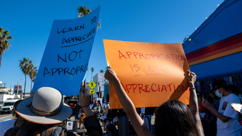 appropriation protest posters