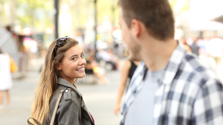 woman and man making eye contact