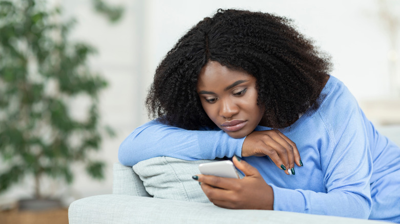 Woman looking at phone