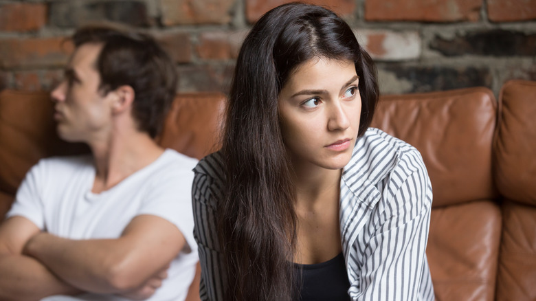 two people looking away each other