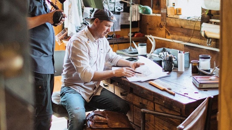 Ben Dozier working at his desk