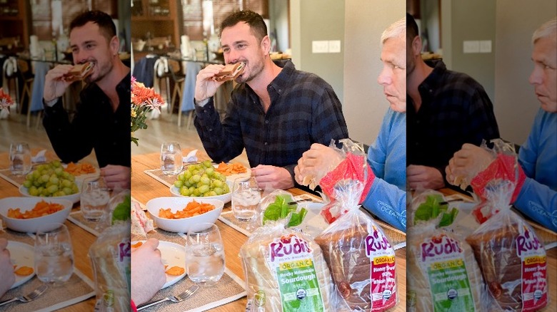 Ben Higgins sharing sandwiches and bread