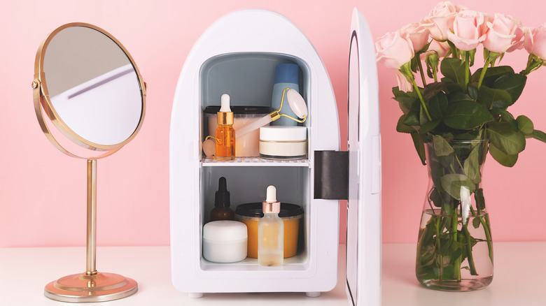 skincare products sitting on a mini fridge 