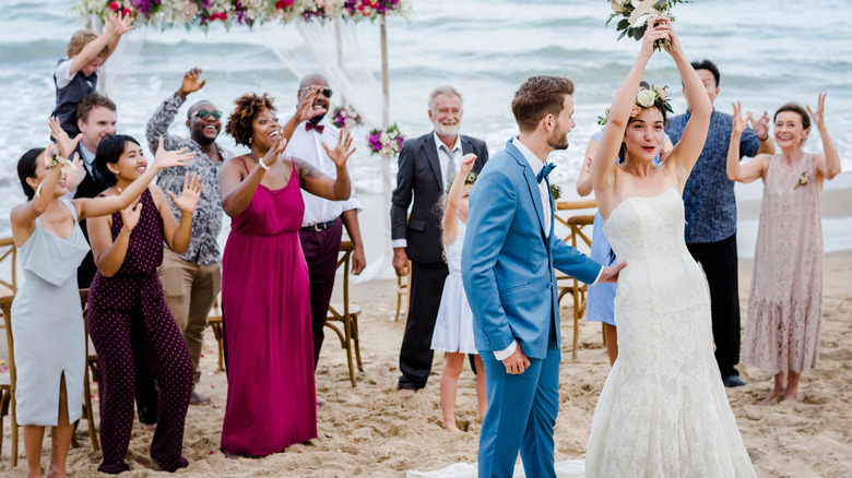 Beach wedding guests
