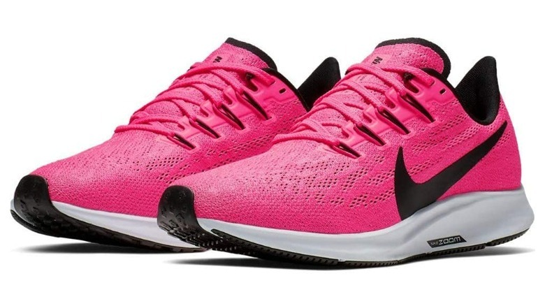 Pink and black women's running shoes