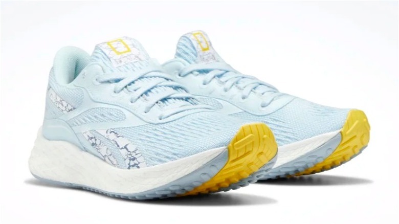 Women's running shoe in light blue color