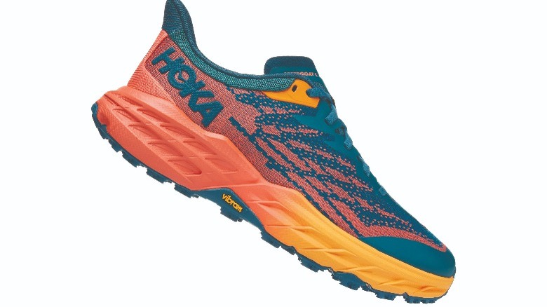 Orange and teal women's running shoe