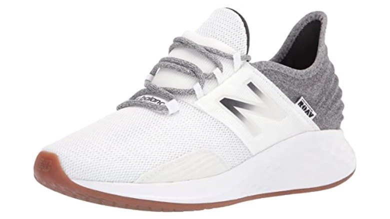 White and gray women's running shoe