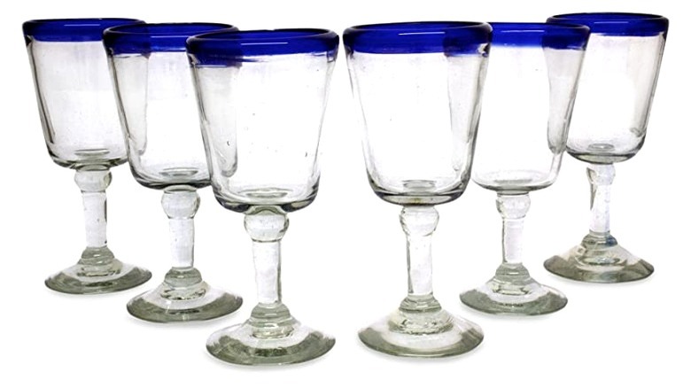 Six wine glasses with blue rims