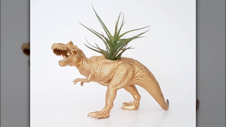 Gold dinosaur planter 