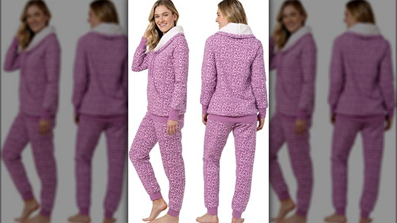 Woman wearing pink leopard spot fleece pajamas