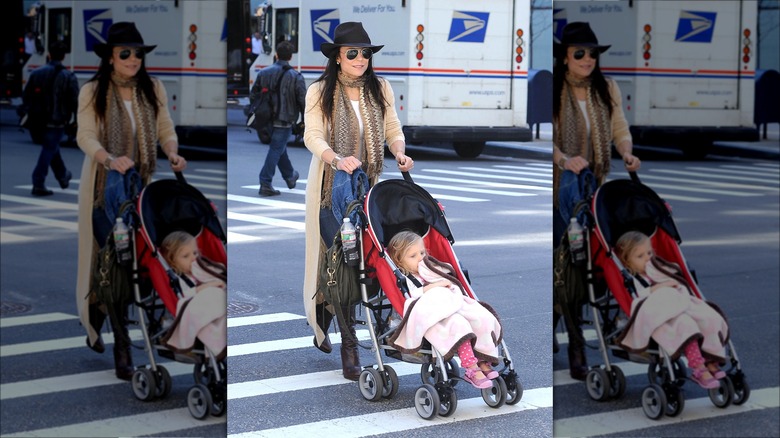 Bethenny pushing a stroller