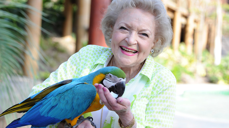 Betty White holding bird