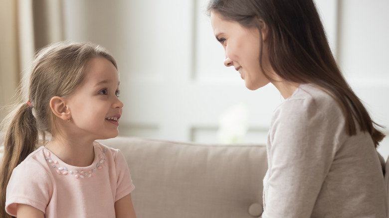 Babysitter talking to child