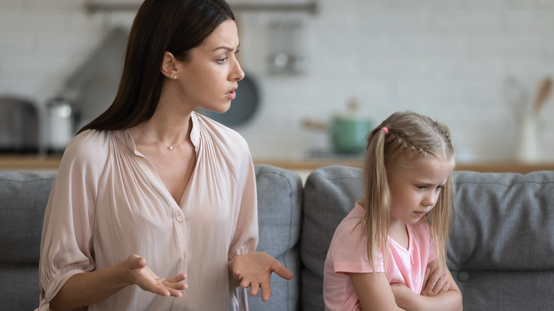 Babysitter with unhappy child